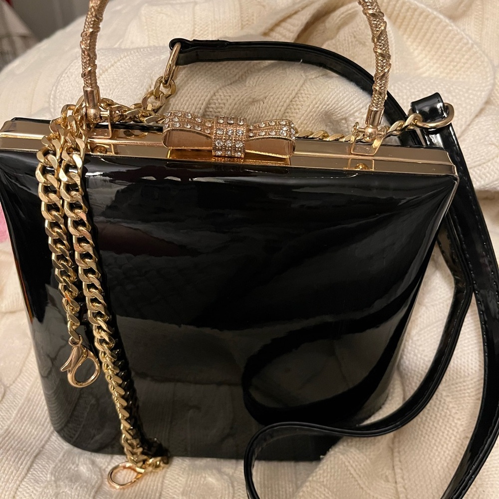 Elegant Black and Gold Clutch with Chain